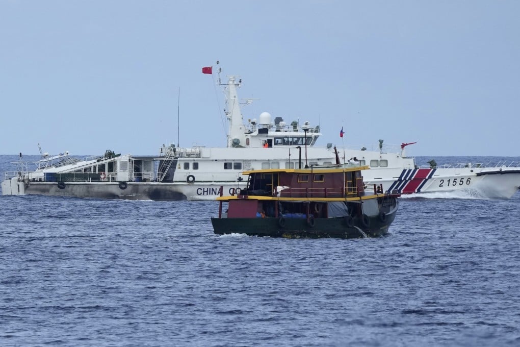 A Chinese coastguard vessel tries to block a Philippine supply boat as it heads towards Second Thomas Shoal, locally known as Ayungin Shoal, at the disputed South China Sea in August. Photo: AP