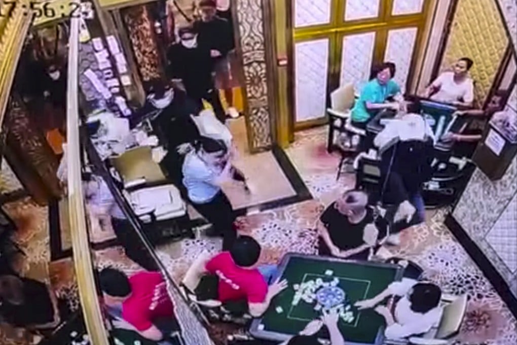 A video posted online shows customers fleeing the mahjong parlour. Photo: Handout