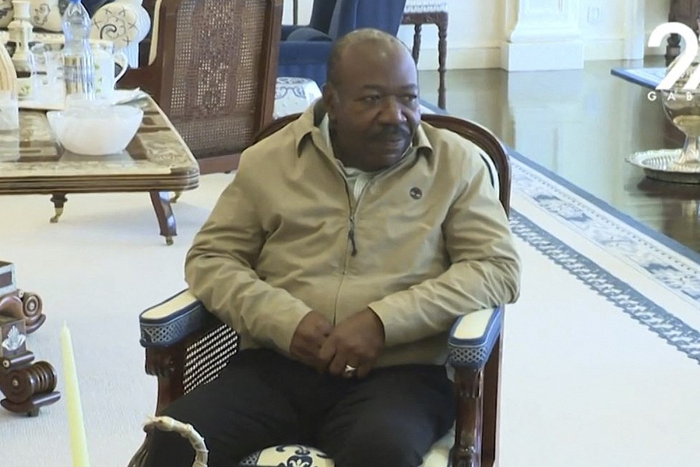 Deposed president Ali Bongo was shown on television meeting with UN special envoy Abdou Abary (unseen). Photo: AFP