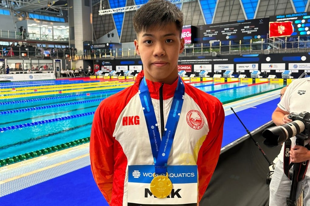 Adam Mak with his gold medal at the World Aquatics Junior Swimming Championships. Photo: Handout