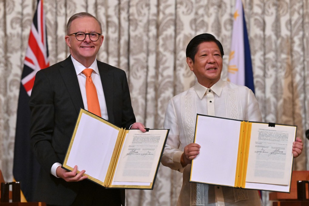 Philippine President Ferdinand Marcos and Australian Prime Minister Anthony Albanese sign an MOU for a strategic partnership in Manila on Friday. Photo: EPA-EFE