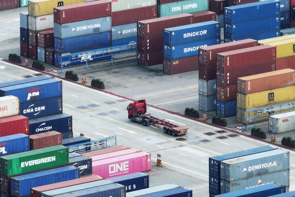 A truck drives between containers at Nanjing port in Nanjing, in China’s eastern Jiangsu Province. Photo: AFP