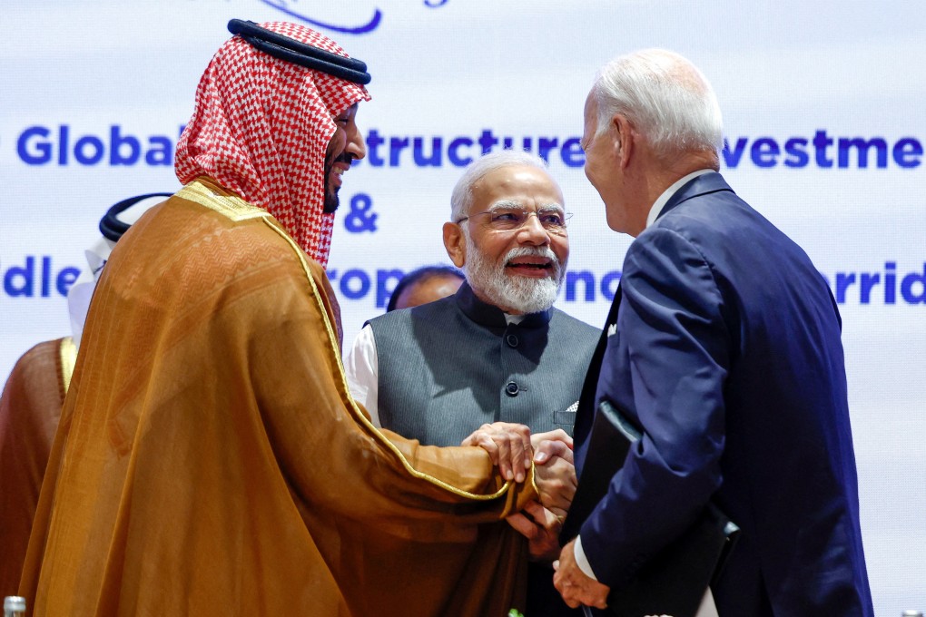 Saudi Arabian Crown Prince Mohammed bin Salman Al Saud and US President Joe Biden shake hands next to Indian Prime Minister Narendra Modi at the G20 summit in New Delhi on Saturday. Photo: Reuters
