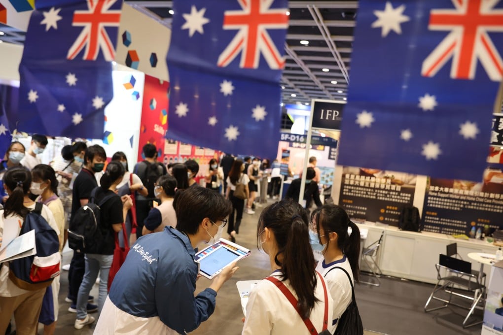 Students visit an education expo in Hong Kong at a booth adorned with Australian flags. Photo: Nora Tam