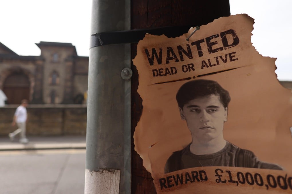 A spoof ‘wanted’ poster is seen outside outside Wandsworth prison in London on Friday. Photo: EPA-EFE