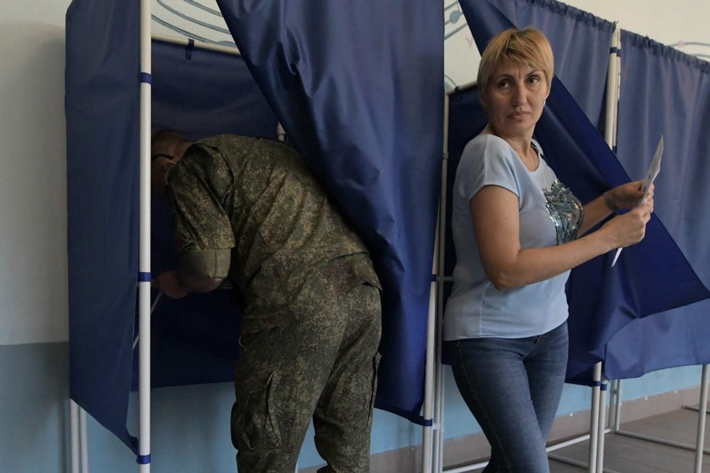 People voting at a polling station in Donetsk, Russian-controlled Ukraine. Photo: AFP