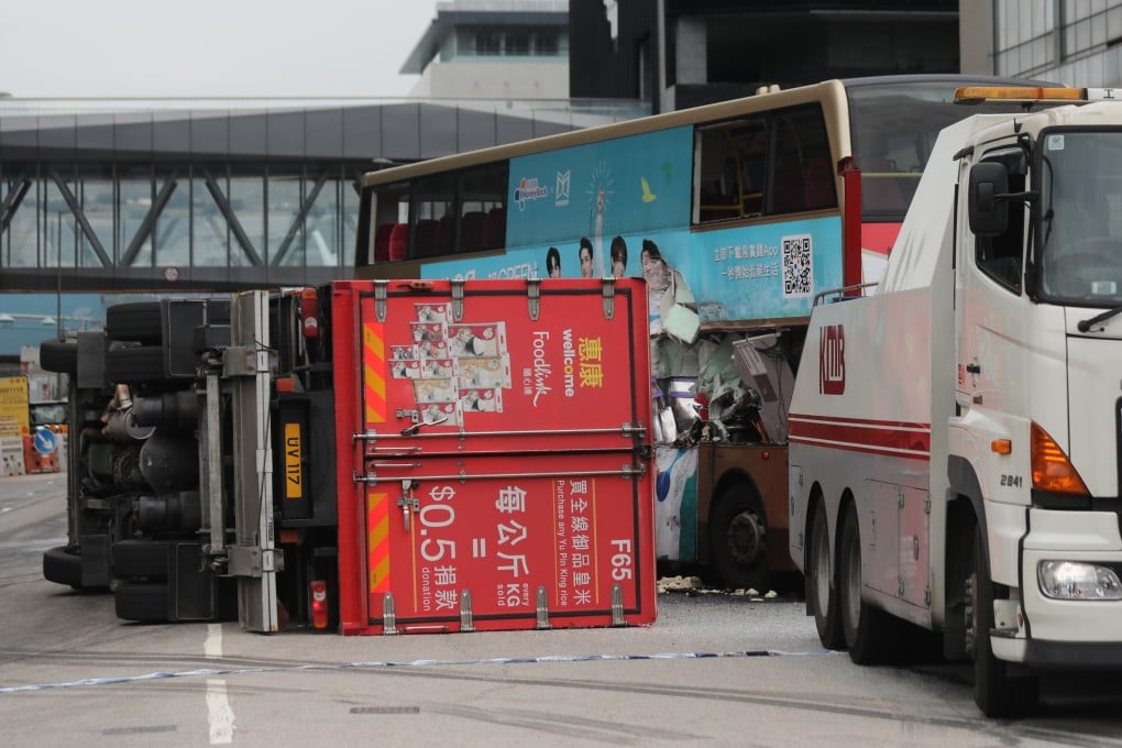 A truck lies on its side after it crashed into a KMB bus at the Tseung Kwan O Industrial Estate in Tseung Kwan O on April 7. Photo: Xiaomei Chen