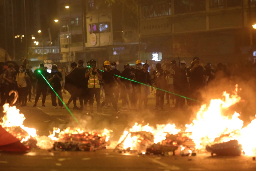 About 200 black-clad demonstrators had hurled petrol bombs, bricks and glass bottles at the protest in Tsuen Wan. Photo: May Tse
