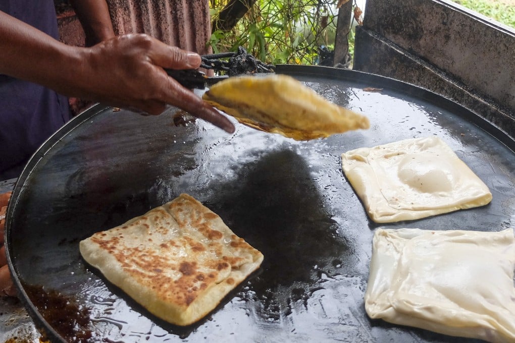 Roti canai was awarded a grand total of 4.9 stars by TasteAtlas, putting it on par with the No 2 bread, Colombia’s ‘pan de bono’. Photo: Shutterstock