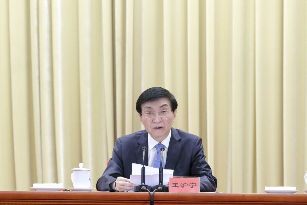 Wang Huning, a member of the Politburo Standing Committee, speaks at a meeting of the China Council for the Promotion of Peaceful National Reunification in Beijing on Monday. Photo: Xinhua