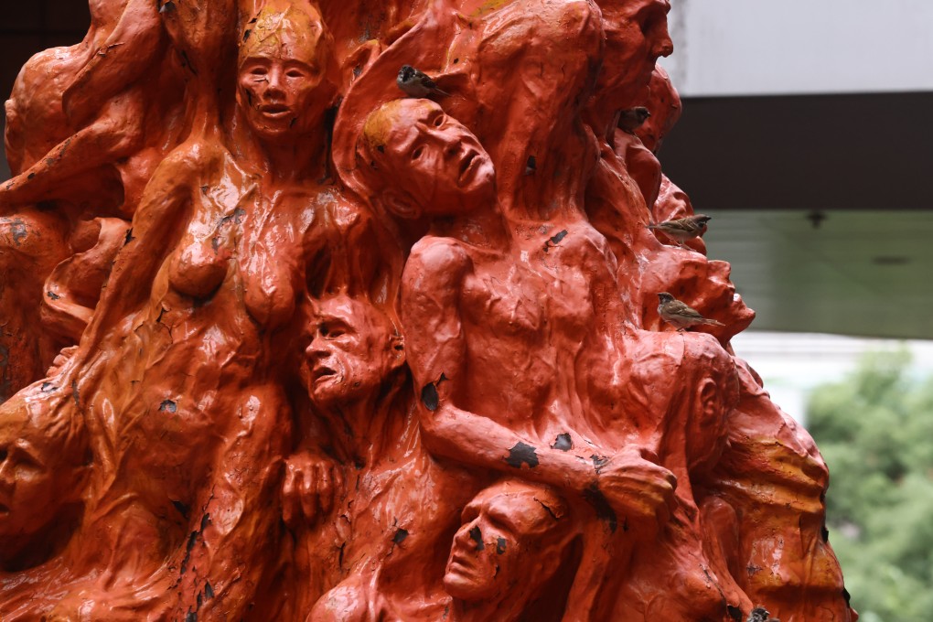 A student has been jailed for sedition after she planned to unfurl a banner featuring the controversial Pillar of Shame sculpture. Photo: K. Y. Cheng