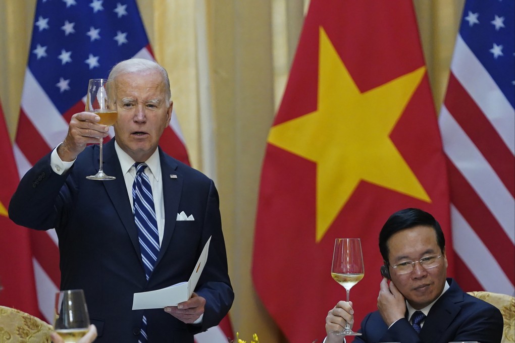 US President Joe Biden raises a toast alongside Vietnam President Vo Van Thuong in Hanoi on Monday. Photo: AP