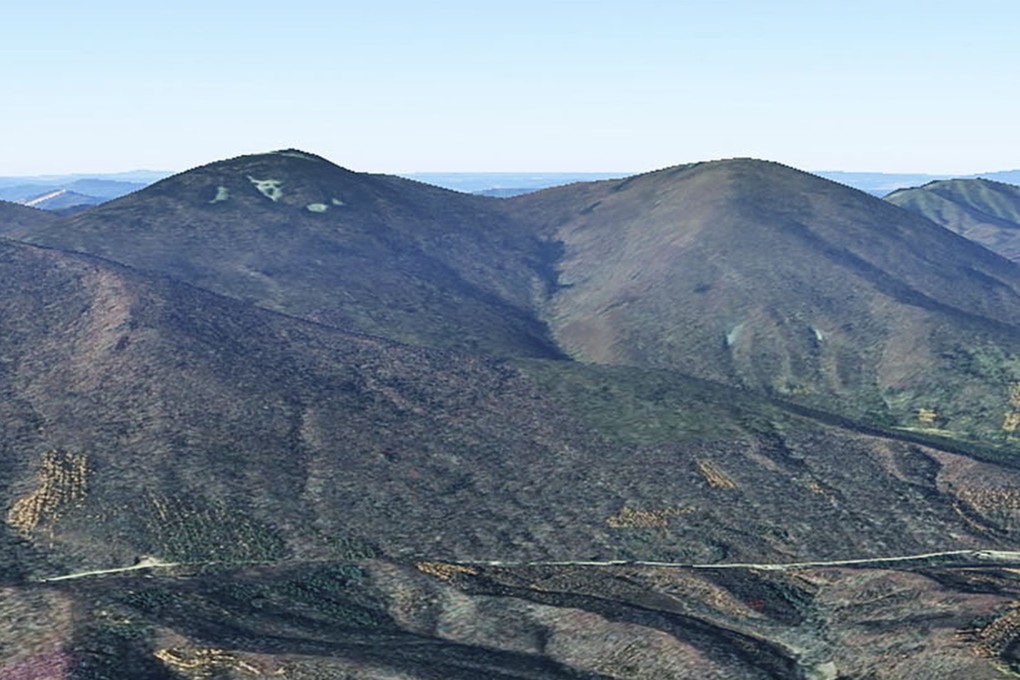 Chinese scientists have found evidence that Baijifeng Mountain was hit by an object from space, resulting in its twin peaks and unique impact structure. Photo: Centre for High Pressure Science and Technology Advanced Research