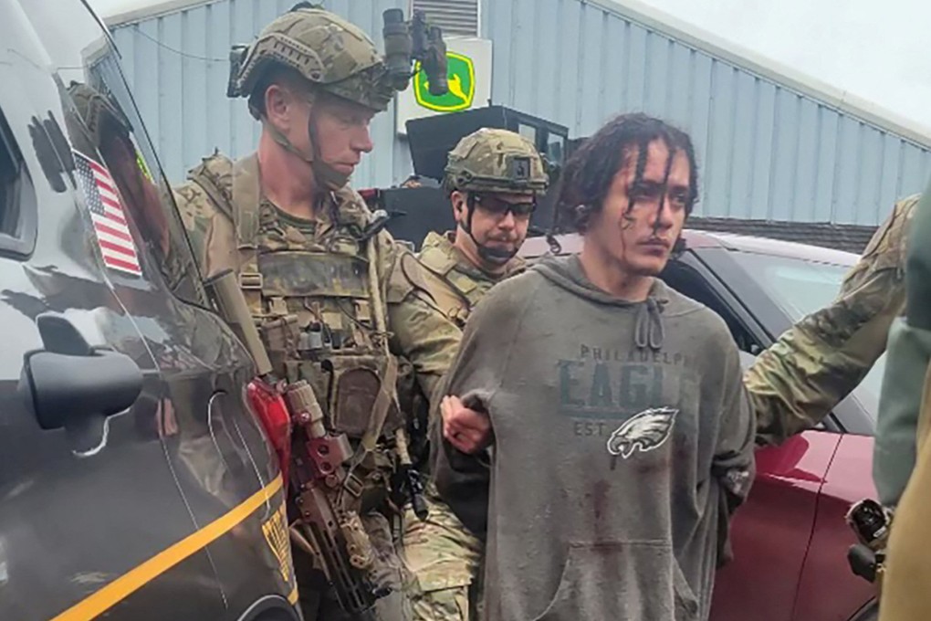 Escaped fugitive Danelo Cavalcante is taken into custody by law enforcement officers in Pennsylvania. Photo: Pennsylvania State Police/Handout via Reuters