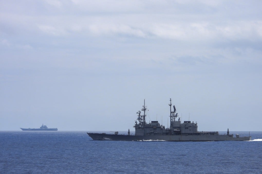 Taiwan’s navy ship Kee Lung in the foreground monitors the PLA aircraft carrier Shandong on Monday. Photo: Taiwan Ministry of National Defence via AP