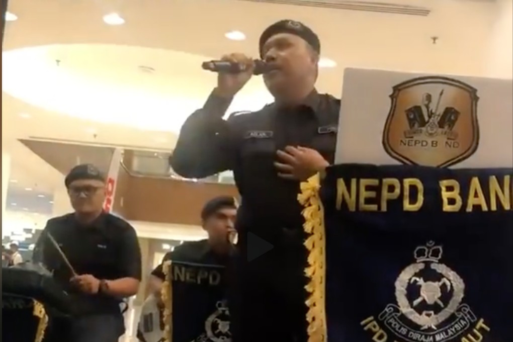 An  all-Malay musical police band set social media alight with a video of them singing the Cantopop hit number “Hai Kuo Tian Kong”. Photo: SCMPOST