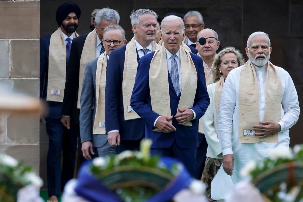 Indian Prime Minister Narendra Modi (right) and US President Joe Biden (centre) are among world leaders arriving to pay their respects at a memorial site dedicated to Mahatma Gandhi on the sidelines of the G20 summit in New Delhi on September 10. Photo: TNS