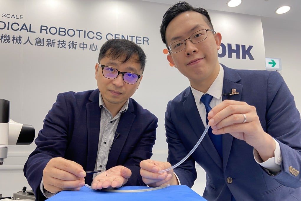 Chinese University of Hong Kong academics Zhang Li and Tony Chan showcase a new micro robot that can eliminate dangerous bacteria inside medical implants in patients. Photo: Elizabeth Cheung