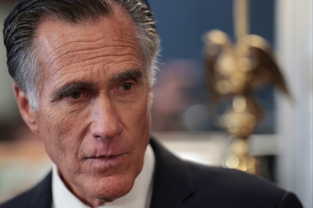 US Senator Mitt Romney answers questions in his office on Wednesday after announcing he will not seek re-election. Photo: AFP