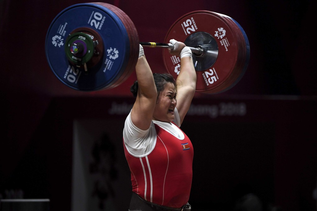 North Korea’s Kim Kuk-hyang competes in the clean and jerk at the 2018 Asian Games in Jakarta. Photo: AFP
