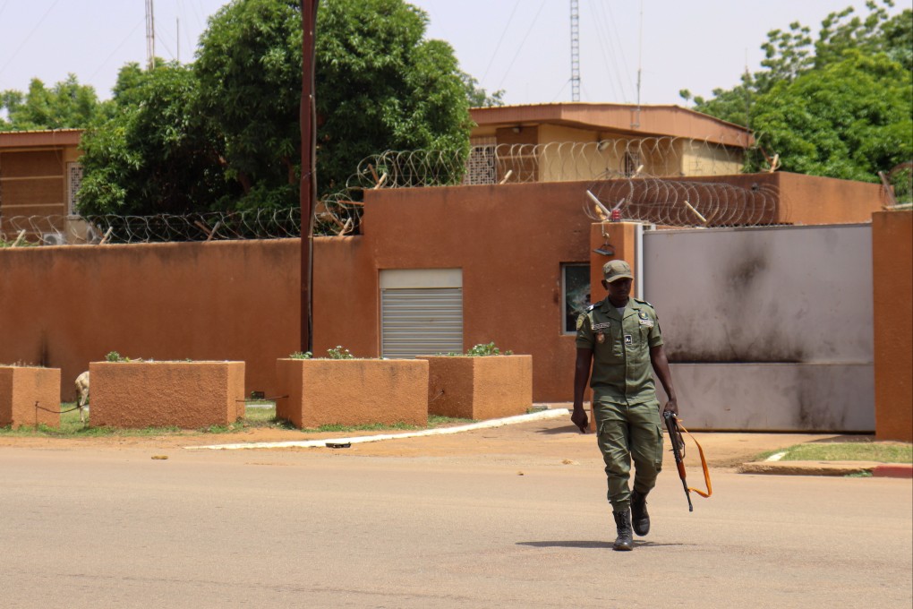 An armed man patrols outside the French embassy in Niamey, Niger on September 1. Photo: EPA-EFE