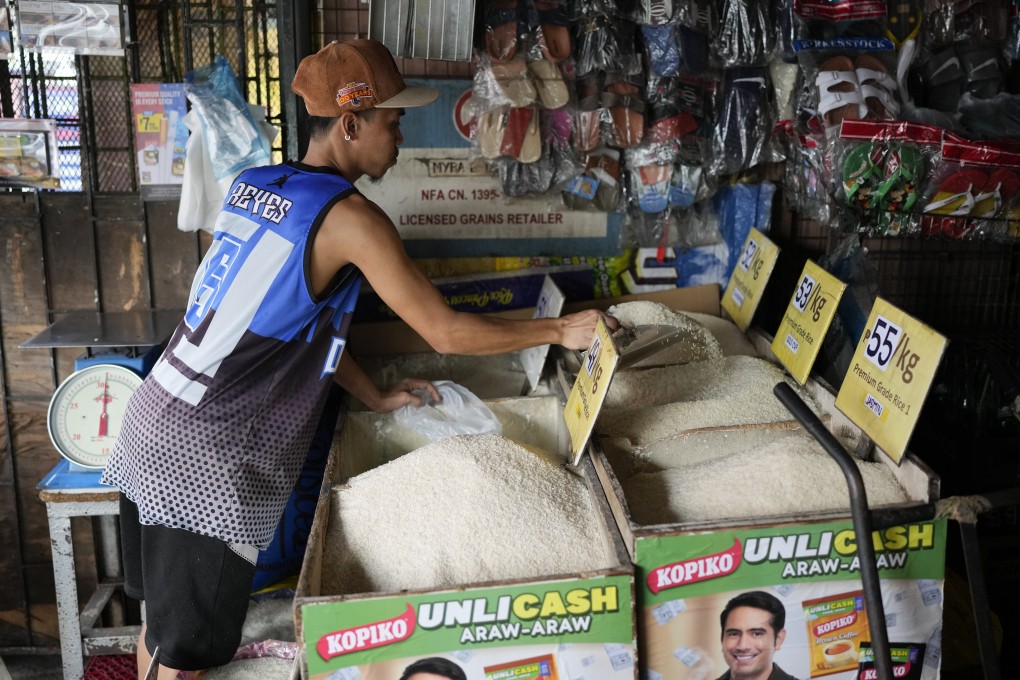 A vendor sells rice at a store in Quezon city, Philippines. Photo: AP