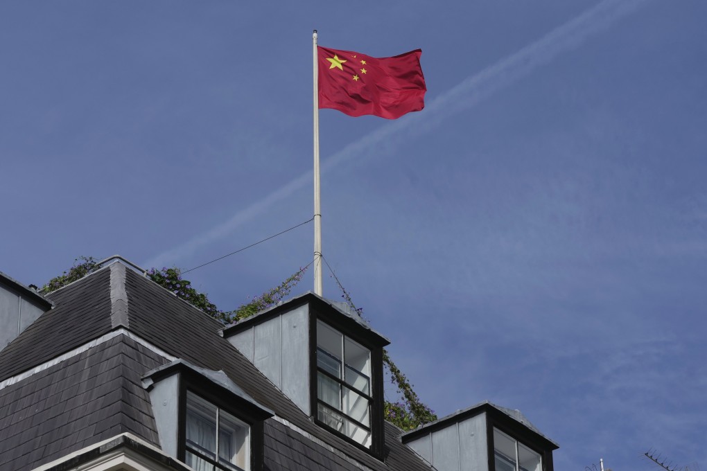 The national flag flies above the Chinese embassy in London on September 11. British Prime Minister Rishi Sunak has chastised China for what he called unacceptable interference in British democracy after a newspaper reported that a researcher in Parliament was arrested earlier this year on suspicion of spying for Beijing. Photo: AP