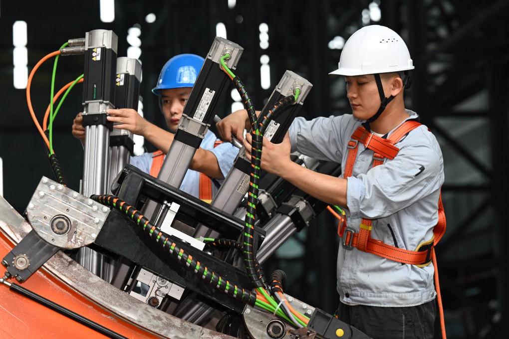 Staff members test equipment at the Comprehensive Research Facility for Fusion Technology (CRAFT) in east China’s Anhui province. Photo: Xinhua