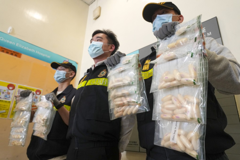 Hong Kong customs displays cocaine a passenger allegedly had hidden in his body as he arrived at the airport earlier this year. Photo: Sam Tsang