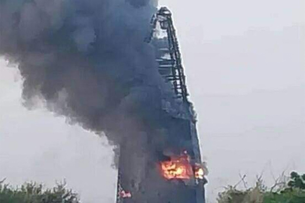 A fire raging at the Greater Nile Petroleum Oil Company Tower in Khartoum. Photo: AFP