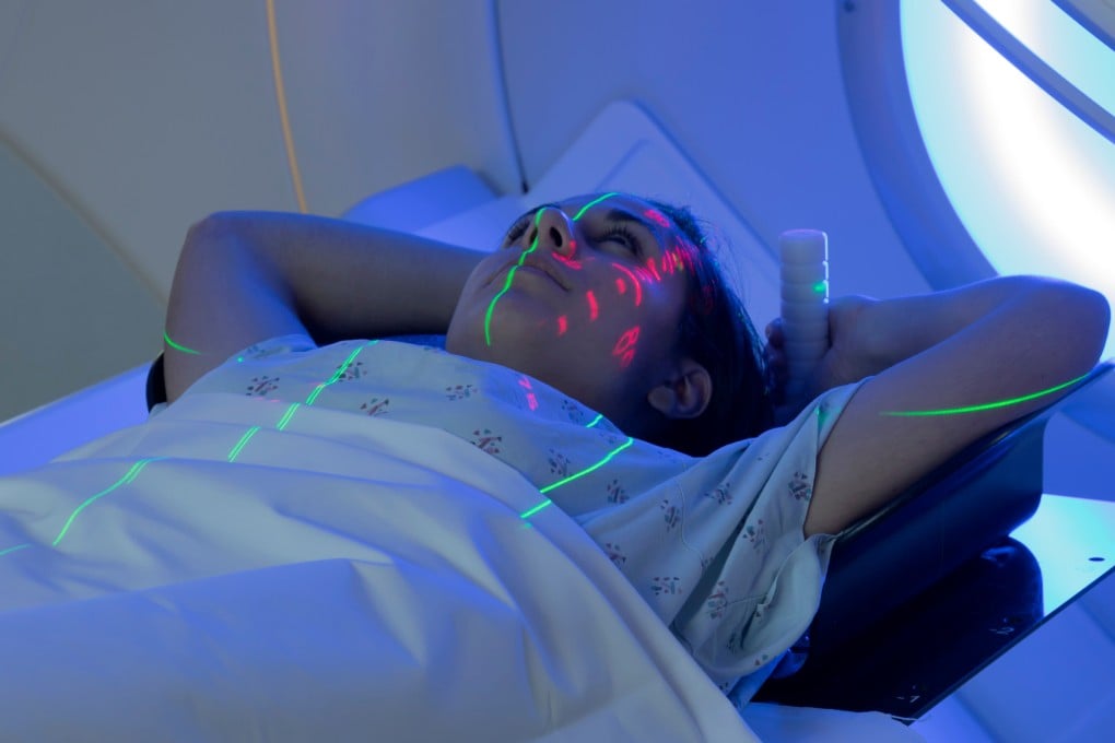 A woman receives radiation therapy treatment for cancer. Confusing interactions and a lack of communication between public and private healthcare providers are making some Hongkongers less willing to seek early treatment for cancer and other diseases. Photo: Shutterstock
