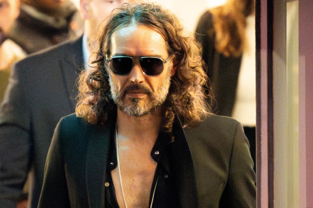 Russell Brand leaves the Troubabour Wembley Park theatre in northwest London after performing a comedy set. Photo: PA Wire/dpa