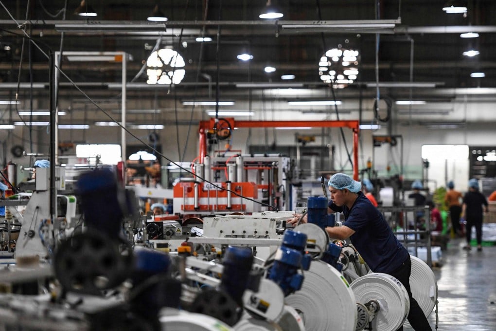 Vietnam’s relatively stable political environment and a young, low-cost workforce has long made it a manufacturing and export hub in the region. Photo: AFP