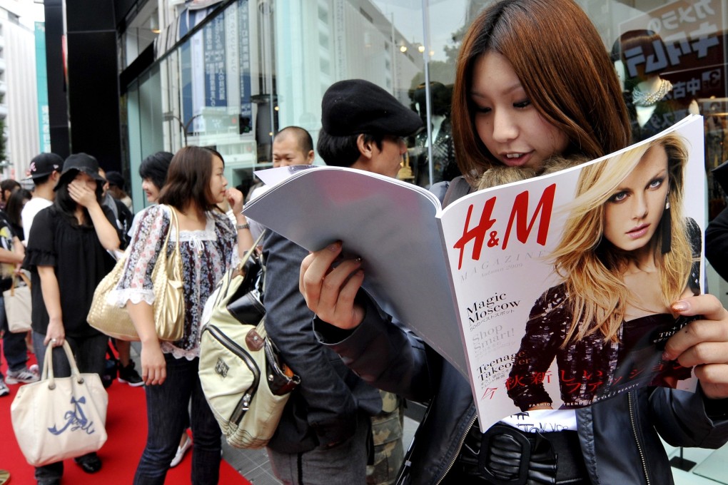 People wait in line for the opening of a new H&M store in Tokyo in 2009. Global lifestyle fashion brands and retailers often find it hard to break into the Japanese consumer market. Photo: Getty Images