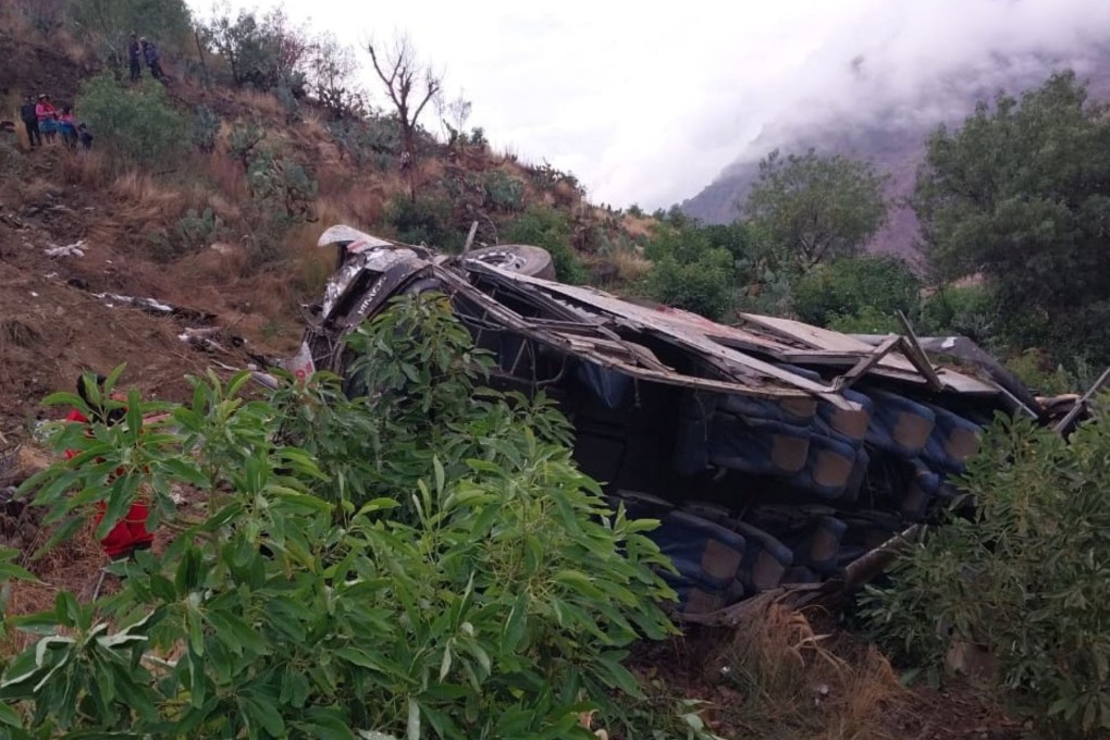 The wreckage of a bus that fell into a ravine in Huaccoto, Churcampa province, Peru on Monday. Photo: EPA-EFE / Agencia Andina / Handout