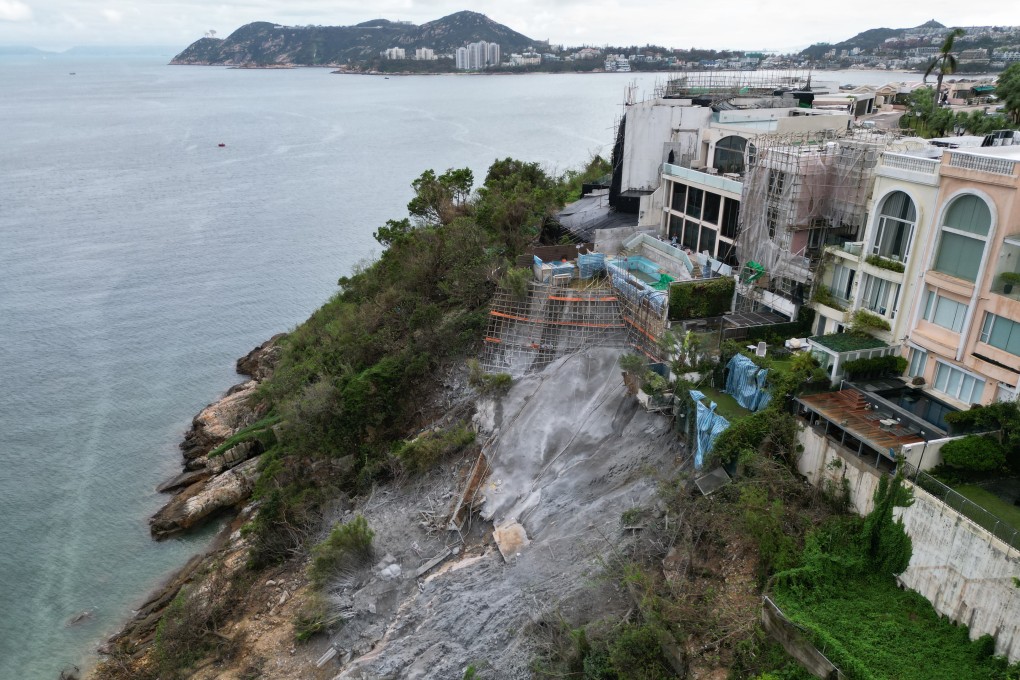 Workers make emergency repairs at a slope by the  Redhill Peninsula luxury estate in Tai Tam. Photo: Dickson Lee