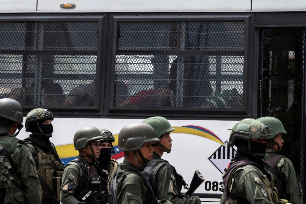 Inmates aboard a bus were transferred from the prison to other facilities. Photo: AFP