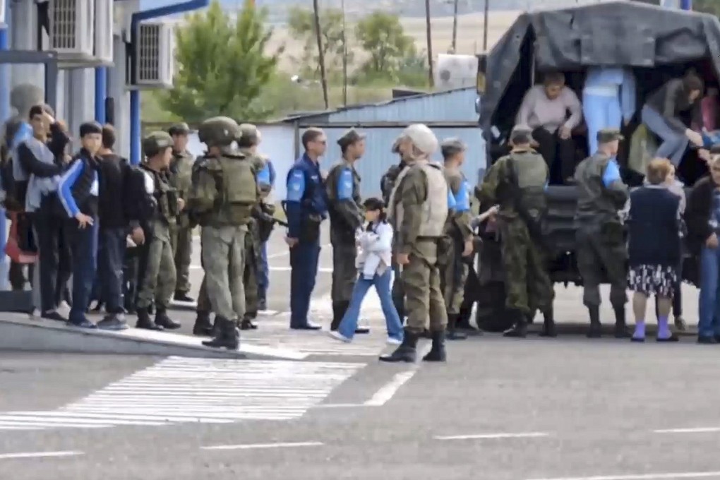 Russian peacekeepers evacuating civilians at an undisclosed location in Nagorno-Karabakh. Photo: EPA/EFE