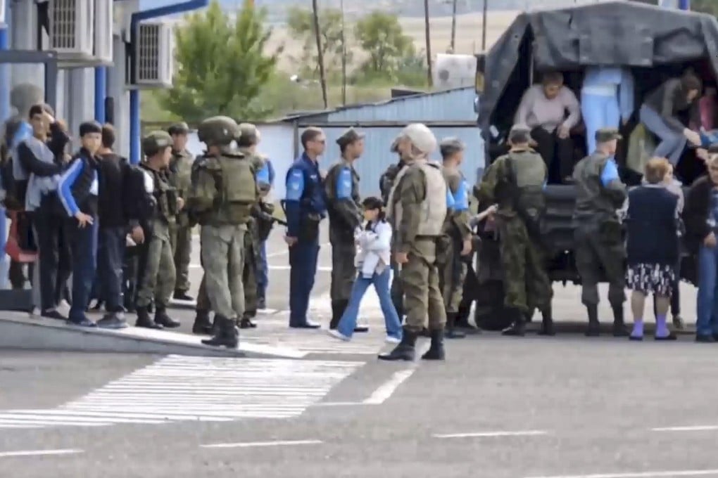Russian peacekeepers evacuating civilians at an undisclosed location in Nagorno-Karabakh. Photo: EPA/EFE