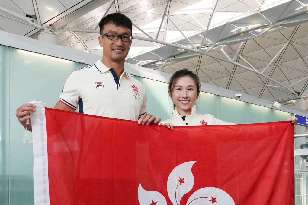 Hong Kong flagbearers Salom Yiu (left) and Juanita Mok at Hong Kong International Airport. Photo: Elson Li