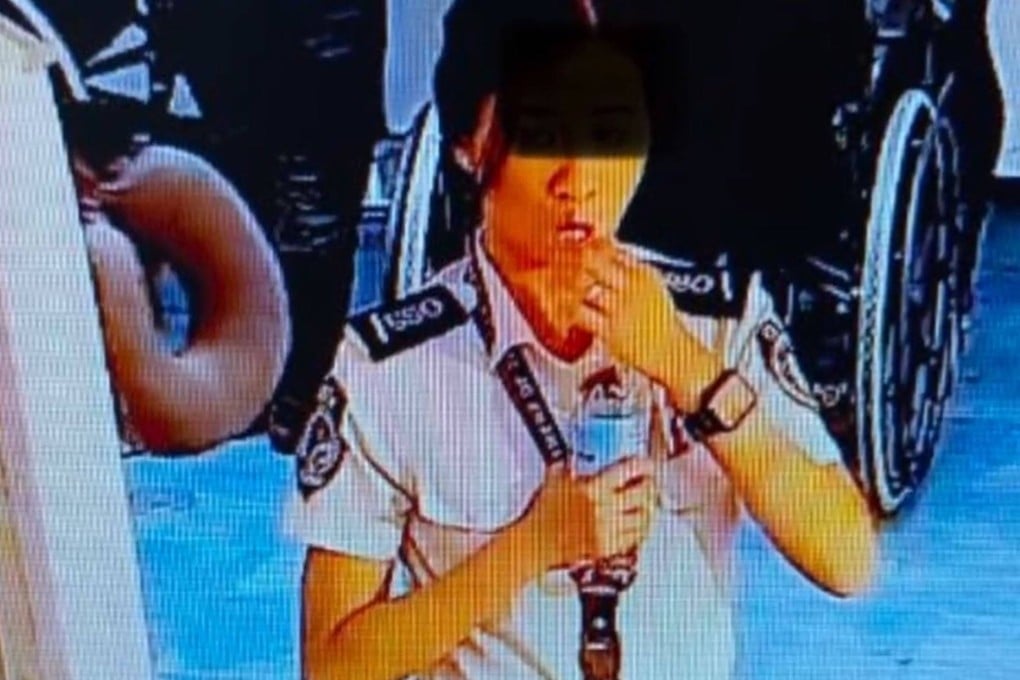 CCTV footage shows a Manila airport screening officer allegedly swallowing US$300 in bills. Photo: Twitter/raoulesperas