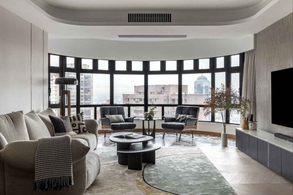 The living room of a family home in Mid-Levels, on Hong Kong Island, where the design marries the husband’s desire for minimalism and his wife’s liking for a colourful, quirky aesthetic. Photo: hoo
