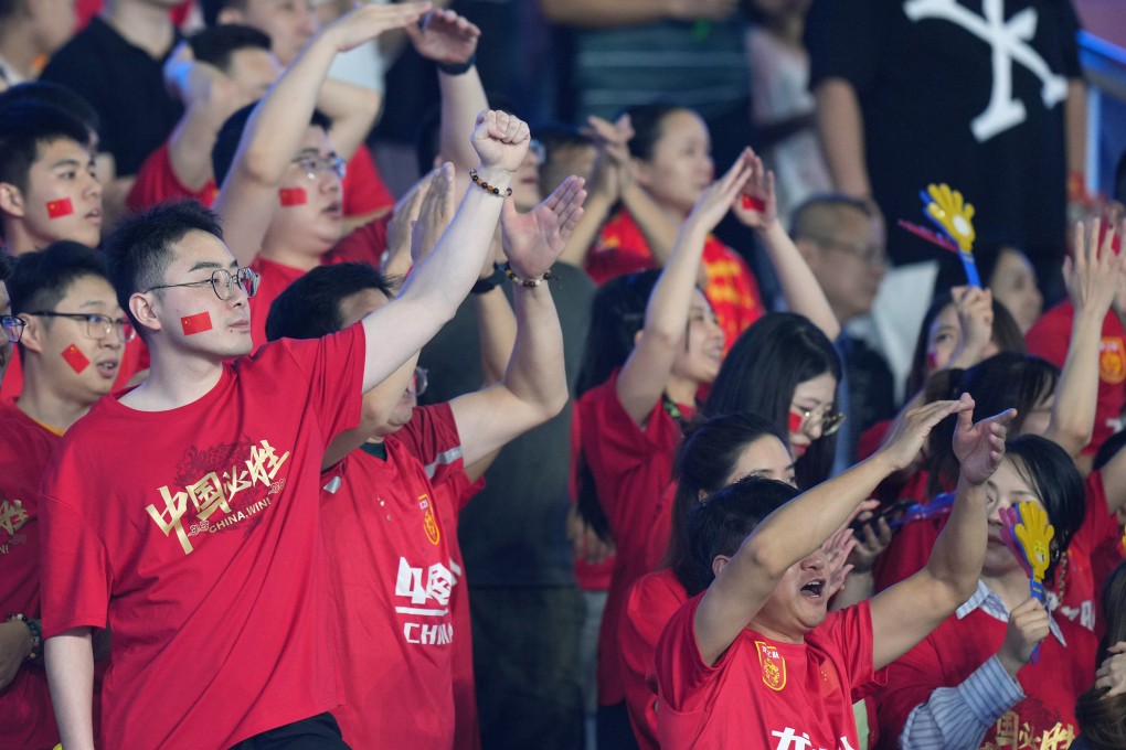 Fans cheer for China during the men’s football group A round match between Myanmar and China at the Asian Games, September 21, 2023. Photo: Xinhua