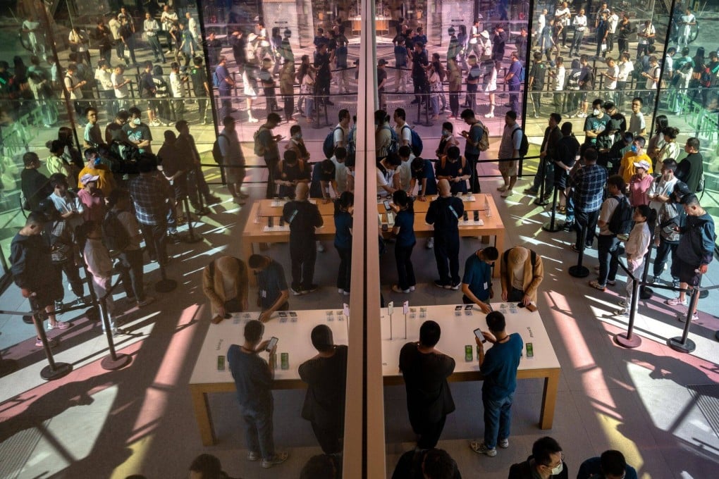 Customers queue at an Apple store in Beijing on Friday, the first day of sale of the iPhone 15. Photo: Bloomberg