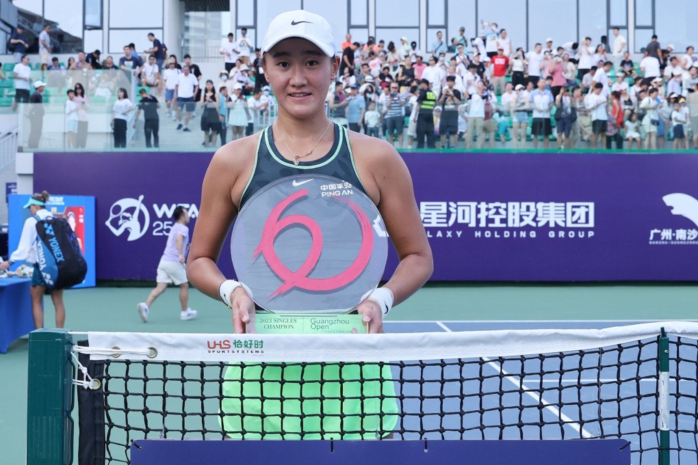 Wang Xiyu holds her first WTA Tour trophy after winning on home soil in Guangzhou. Photo: WTA