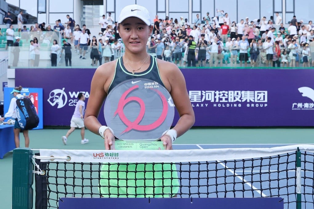 Wang Xiyu holds her first WTA Tour trophy after winning on home soil in Guangzhou. Photo: WTA