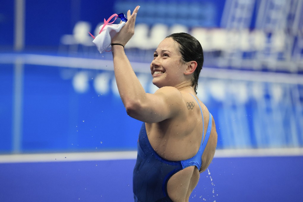 Siobhan Haughey waves to her parents after winning the 200m freestyle at the Asian Games. Photo: Dickson Lee