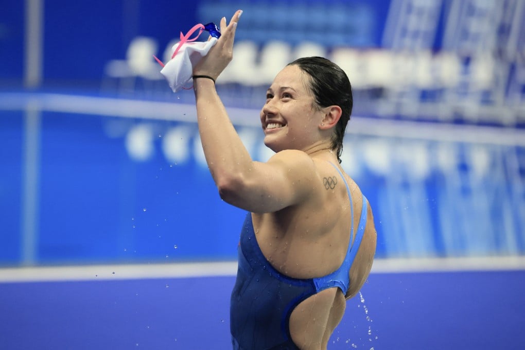 Siobhan Haughey waves to her parents after winning the 200m freestyle at the Asian Games. Photo: Dickson Lee