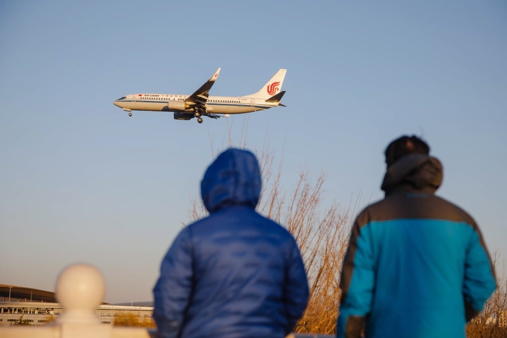 A passenger airplane lands in Beijing Capital International Airport on December 27, 2022. Flights between the US and China are scheduled to increase in October per an agreement between the two countries. Photo: EPA-EFE