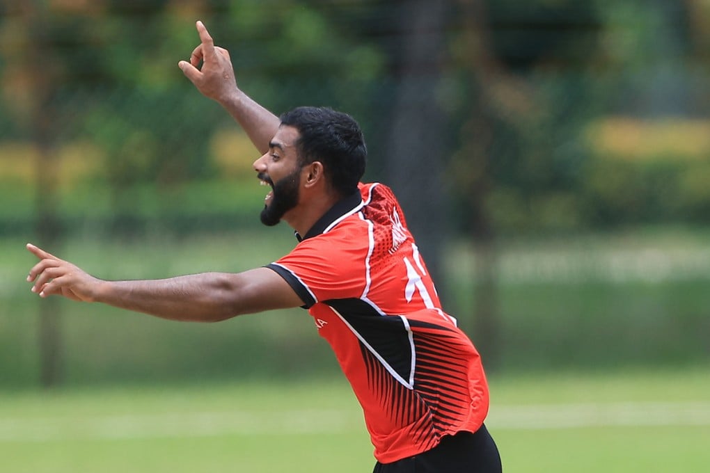 Nasrulla Rana celebrates after taking a wicket against Papua New Guinea on Sunday. Photo: Malaysia Cricket Association